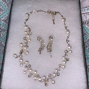 Necklace and earrings.